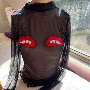 Sexy little lip body suit